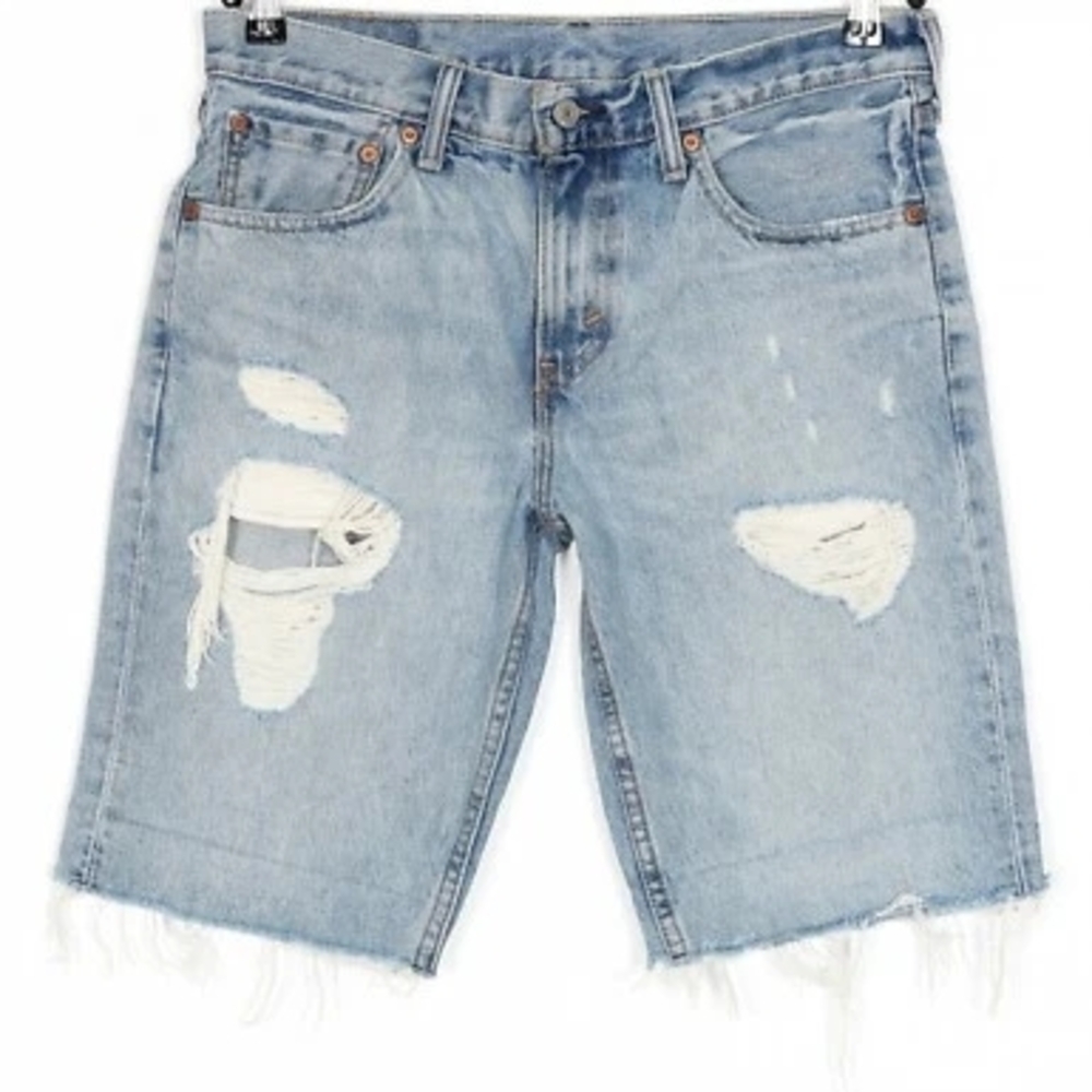 PreOwned Levi's Light Blue Ripped Denim Shorts. In Good Condition.